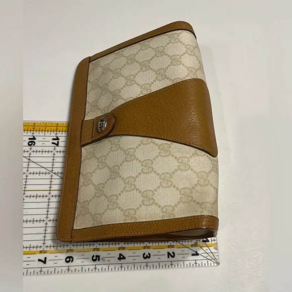 Gucci pvc/leather clutch